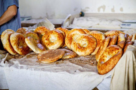 Breads for sale at the market in Tashkent, Uzbekistan, Chorsu bazaar. Traditional Uzbek food.の写真素材