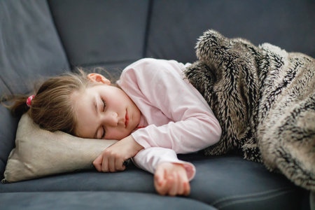 Cute Little Preschool Girl after Sleeping In Bed. Adorable Preschool Child Dreaming, Healthy Sleep Of Children By Day. Deep Sleeping Of Toddler. Kids Resting.の写真素材