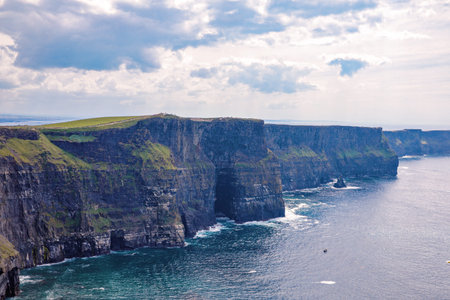 Spectacular Cliffs of Moher are sea cliffs located at the southwestern edge of the Burren region in...