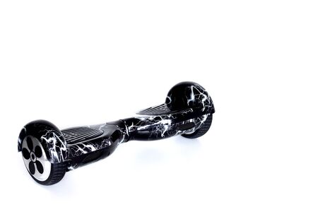 Black self-balancing scooter or hoverboard isolated on white background.の写真素材