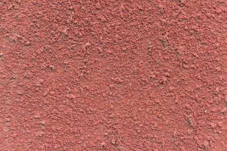 Old texture of pink cement plaster.の写真素材