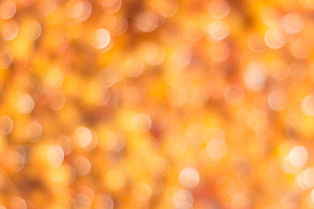 Abstract blurred background in orange-yellow colors.