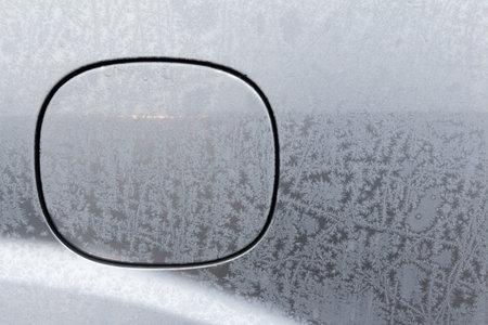The fuel tank cap of the car is covered with a frosty pattern.の写真素材