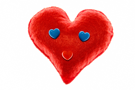 Close-up. Soft red heart. Emotion with blue eyes. A symbol of love and happiness. White background.の写真素材