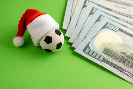 New Year sports betting. The concept of a football victory or a Christmas present. Souvenir soccer...