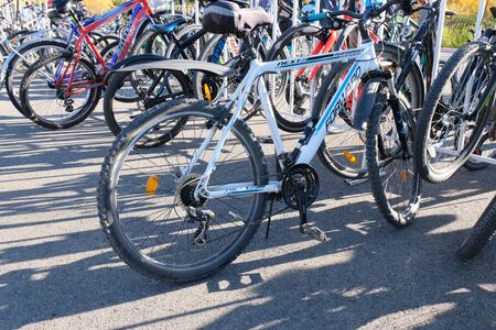 Kostanay, Kazakhstan, 2019-10-06. Many bicycles of different brands are parked on the pavement. Mass ride cyclists. The concept and promotion of sports and a healthy lifestyle. Bike ride.のeditorial素材