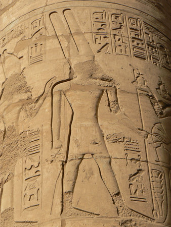 Ancient Egyptian hieroglyphics and reliefs