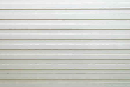 White lacquered wooden cutouts texture.の写真素材