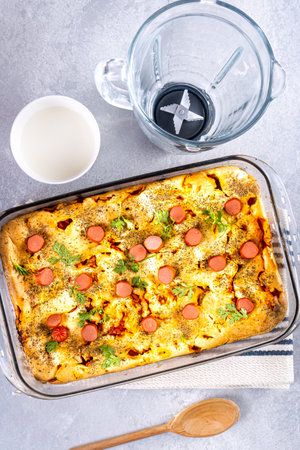 Sausage pie in a blender, typical Brazilian dish. Ingredients: milk, wheat, oil, sausage and corn.の写真素材