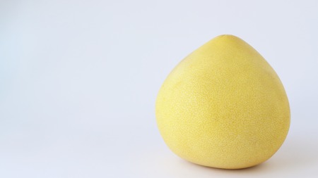 Pomelo fruit on white background. Pomela in orange grid. Citrus maximaの写真素材