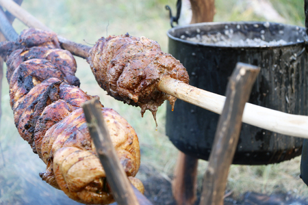 Goth meat cooking on spearの写真素材