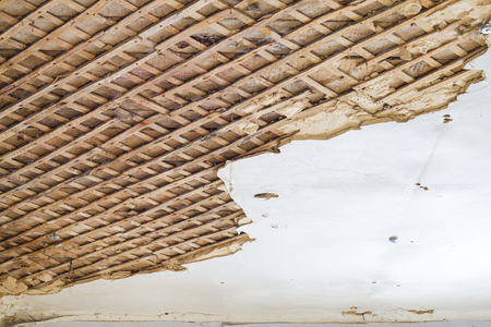 Ceiling before repair. Old wall destroyed decor background. Architecture texture designの写真素材
