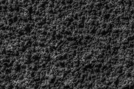Black dark color decorative stucco texture background, Grunge concrete wall template backdropの写真素材