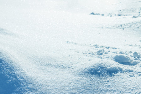 Snow cover winter background. Fresh snowdrift backdrop. Snowy covered landscape. Ice snowflake...