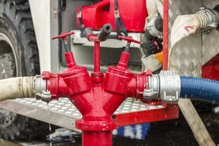 Fire truck equipment. Hoses supply connected to hydrant