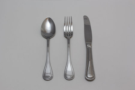 Metallic silverware - fork, knife and spoon