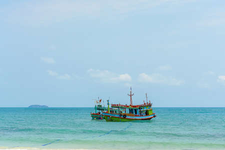 Fishing boat floating in the sea. And is waiting for departureの写真素材
