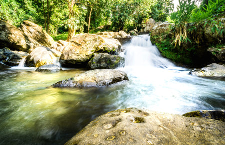 Cold waterfall With natural view And cool wind.