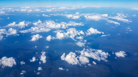 Beautiful views of clouds visible through the glass on the plane. A natural beauty Even if viewed...
