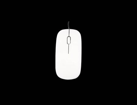 The mouse white and wires is a device for use with a computer.And the modern shape, and one in the object and image isolated with white background  ( clipping path )の写真素材