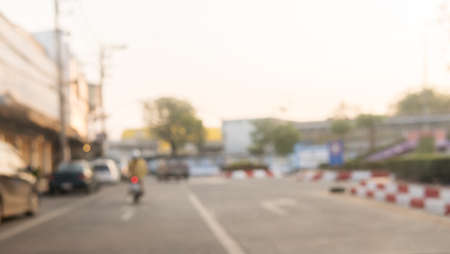 The image is blurred in the town and there are lots of people in the morning.And is suitable for use as a background. And illustrations of people who are shopping.の写真素材