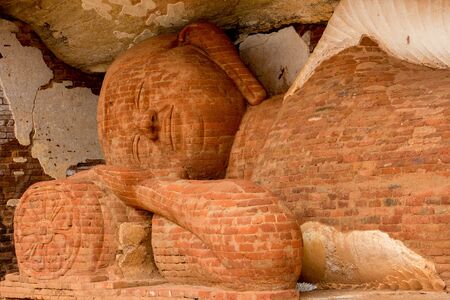 buddha build with brics on the mountain Pidurangala, Sigiriya, Sri Lankaの写真素材