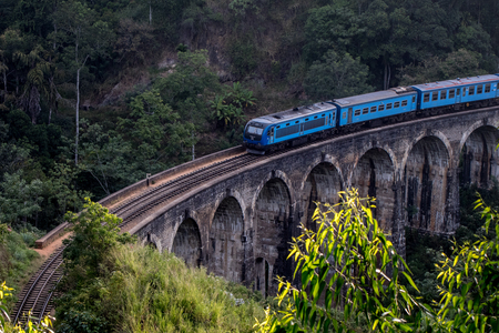 Blue Train on Nine Arch Bridge Demodara, Sri Lankaのeditorial素材