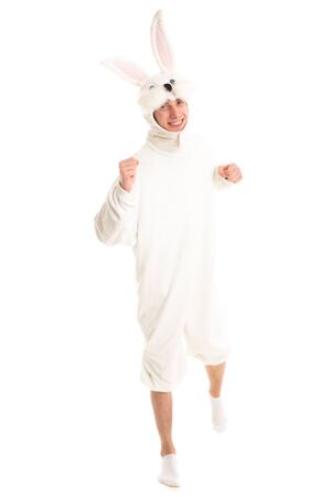 Happy man in a rabbit costume runningの写真素材