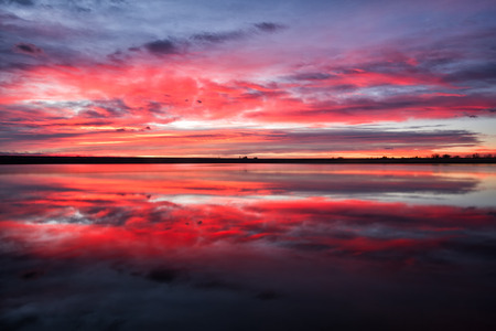 Goregous colorful sunrise on a lake in Coloradoの写真素材