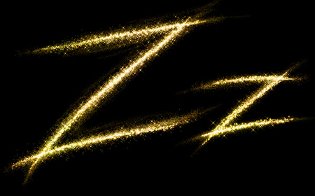 Z letter of gold glittering stars dust flourish tail. Glittering font conceptの写真素材