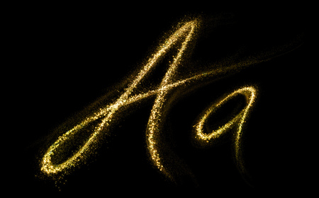 Letter A of gold glittering stars dust flourish tail. Glittering font conceptの写真素材