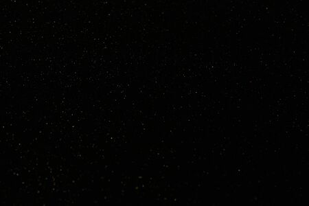 Abstract black glitter techno background. Cosmic shine space conceptの写真素材