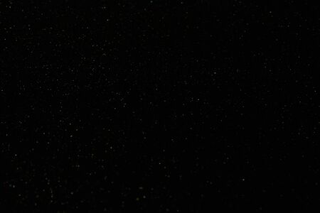 Abstract black glitter techno background. Cosmic shine space conceptの写真素材