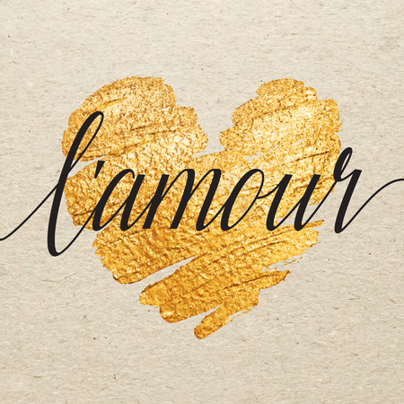 French Valentines day card. L'amour calligraphy lettering with gold paint heart on craft background. Hand drawn letters.のイラスト素材