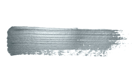Silver glitter paint brush stroke or abstract dab smear with smudge texture on white background. Isolated glittering and sparkling silver paint ink paintbrush splash stain for luxury cosmetic designの写真素材