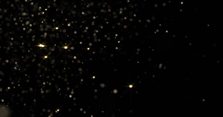 Golden glitter  with sparkling lightの写真素材