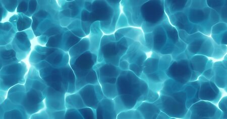 Water surface with sun light reflection and ripples on clear aqua surface.の写真素材