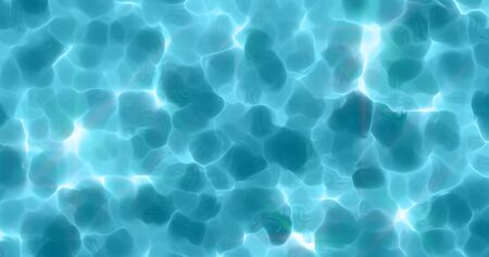 Underwater surface with sun light reflection and ripples on surface background. Sparkling sunlight shine under water in clear pool, sea or blue ocean, top viewの写真素材