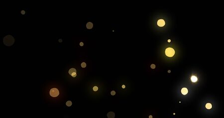 Light bokeh gold abstract on blackの写真素材
