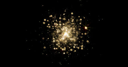 Gold sparkle stars background with bokeh glitter explosion on black. Golden particles magic light for Christmas or New Year, golden confetti in shine explosion and glow effectの写真素材