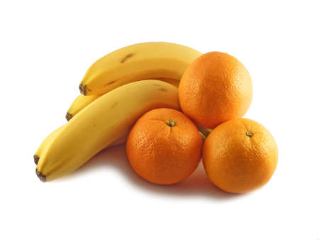 Bananas and oranges isolated on whiteの写真素材