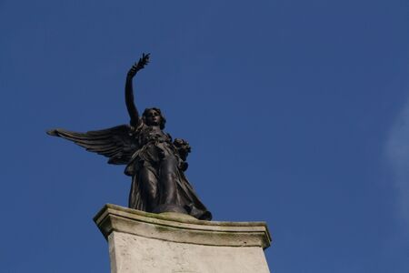 Bronze War Memorial.  Skipton, or Skipton-in-Craven, is a very pleasant market town in North Yorkshire, noted for its castle. At the top of the High Street stands the town's War Memorial.の写真素材