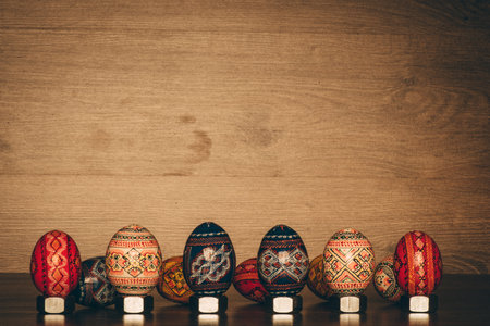 Easter conception with easter eggs at wood background