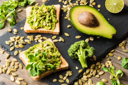 Healthy food. Vegan sandwiches with fresh vegetables on wooden background.