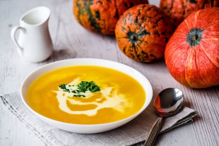 Pumpkin soup with cream and parsley. Vegan foodの写真素材