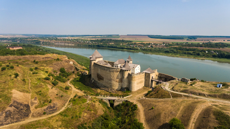 Aerial view of Khotyn medieval castle on the green hill above the river.の写真素材