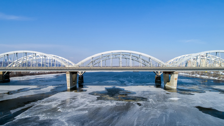 Aerial view of the Kiev city, Ukraine. Dnieper river with bridges. Darnitskiy bridgeの写真素材