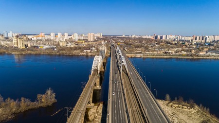 Aerial view of the Kiev city, Ukraine. Dnieper river with bridges. Darnitskiy bridgeの写真素材
