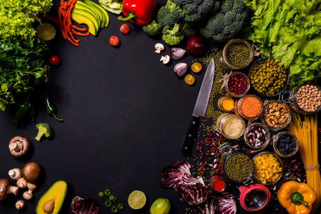 Trend set of fresh vegetables and fruits on black background. Different colorful fresh vegan food....