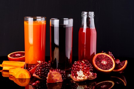Bottles with different colorful drinks. Healthy lifestyleの写真素材